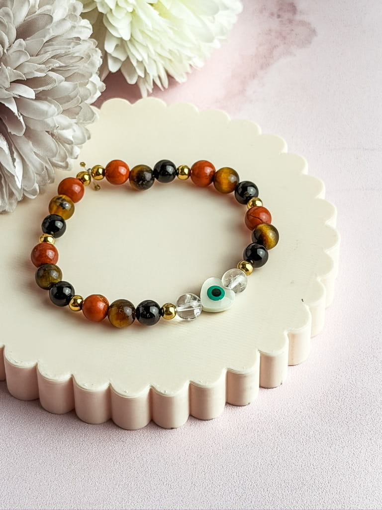 Bracelet Naya en pierres naturelles et nacre avec œil de protection – bijou lithothérapie fait main